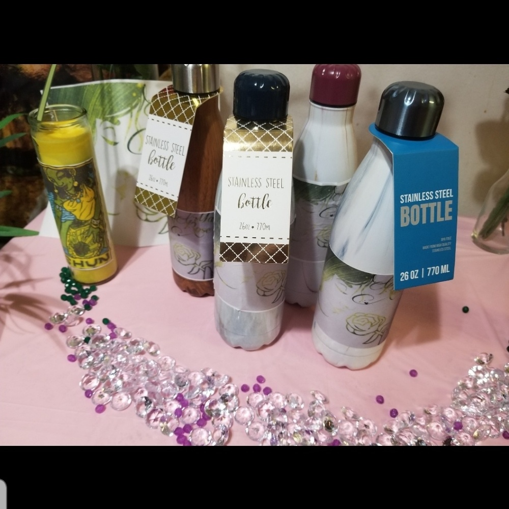 Water bottles and Oshun candles Chargers